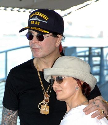 Ozzy_Osbourne_crop Ozzy and Sharon Osbourne touring the USS Missouri battleship in Pearl Harbor, Hawaii while filming their MTV show "The Osbournes." Ozzy wears a USS Missouri cap and sunglasses while Sharon wears a white hat, with his arm around her shoulder.