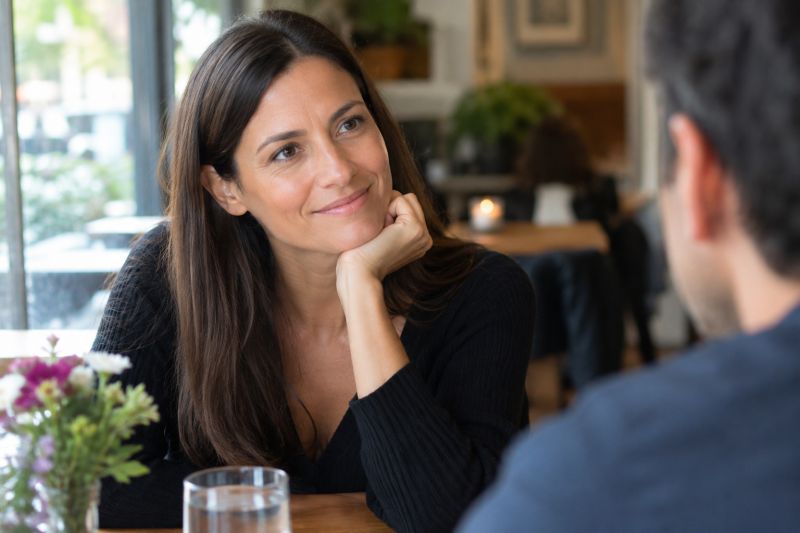 insecurities blog image 2 A woman listening to a date while experiencing fear of rejection.